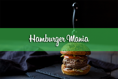 Un hamburger con sopra la scritta "Hamburger Mania"
